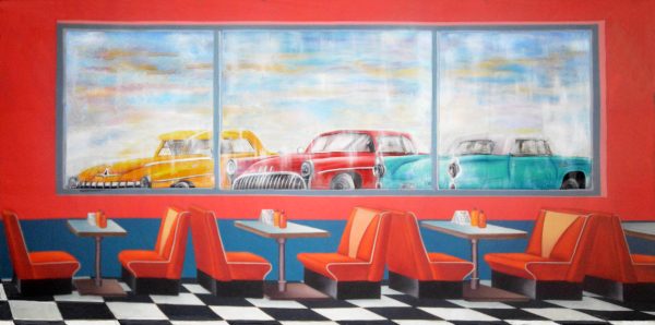 Retro diner mural showing colorful vintage cars through a wide window, with orange seating and a black-and-white checkerboard floor.