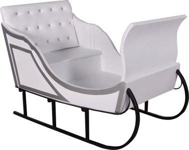 White sled-style chair with tufted back, curved arms, and curved black runners for decoration and seating.